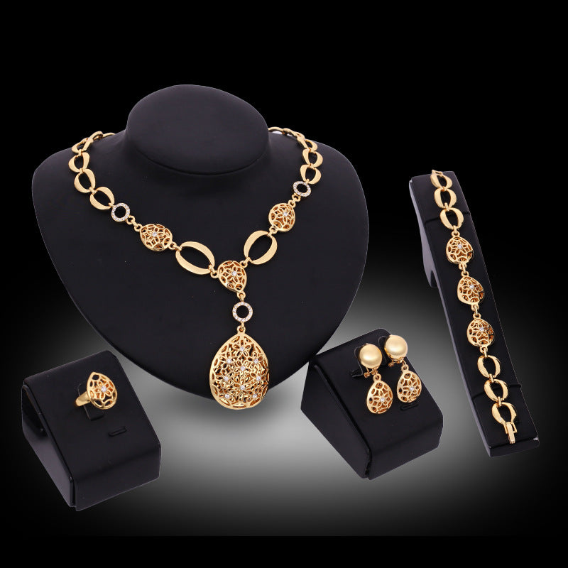 Stunning Elegant Four-Piece Jewelry Set - Necklace, Earrings, Bracelet & Ring for Every Occasion