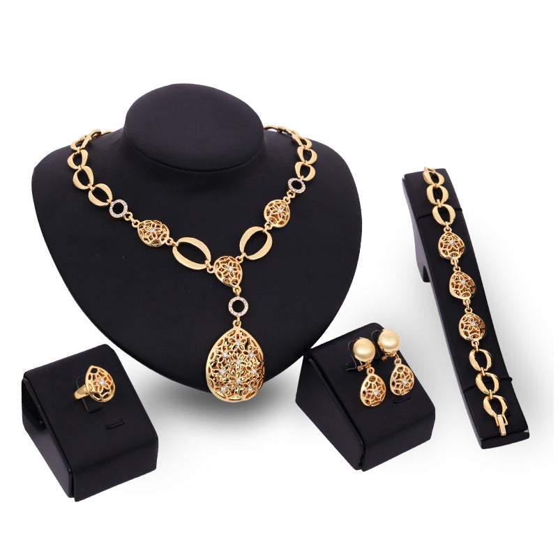 Stunning Elegant Four-Piece Jewelry Set - Necklace, Earrings, Bracelet & Ring for Every Occasion